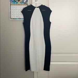 Cocktail length black and white dress